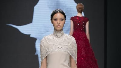 Understated in colour, the intricate beadwork of Cinco’s gowns was accompanied by weighty fishtails and capes. Courtesy Michael Cinco and Couturissimo