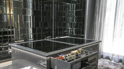 The master bedroom walk-in closet. The villa has silk carpets and the marble floors. Mona Al Marzooqi / The National