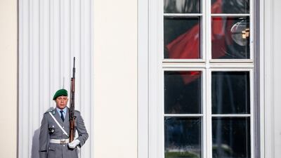 A soldier stands guard prior to the arrival of Turkish President Recep Tayyip Erdoga at Bellevue Castle in Berlin, Germany. Omer Messinger / EPA