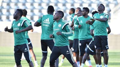 Nigeria players warm up during their team training session on Monday as they get ready for the 2014 World Cup in Brazil. Nicholas Kamm / AFP / June 2, 2014