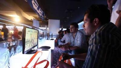 Visitors play at GamesFest at Club West, Grand Midwest Towers in Dubai Media City. Ravindranath K / The National