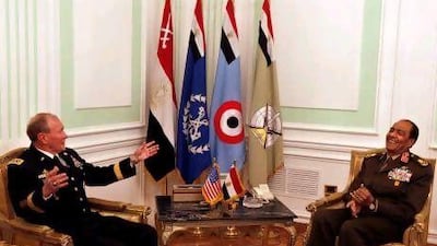 Gen Martin Dempsey, the US Chairman of the Joint Chiefs of Staff, meets with Field Marshal Hussein Tantawi, the head of Egypt’s ruling military council as tensions rise over Cairo’s move to proceed with criminal charges against 19 US pro-democracy workers.