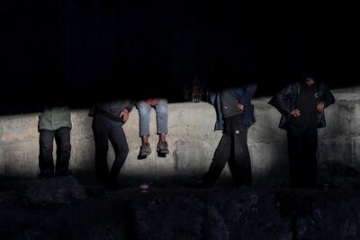 Migrants resting under a bridge near a railway line in Van. EPA