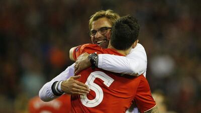 Liverpool manager Juergen Klopp celebrates with Dejan Lovren after the Europa League semi-final second leg. Phil Noble / Reuters
