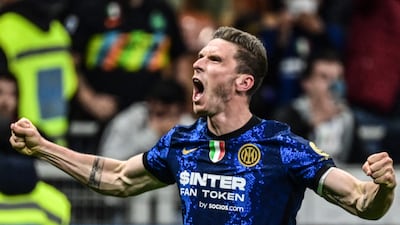 Inter's Robin Gosens celebrates after scoring. AFP