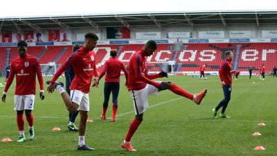 Marcus Rashford, second from right, of England and Manchester United, warms up with teamates ahead of the U20 International Friendly match between England and Canada at the Keepmoat Stadium on March 27, 2016 in Doncaster, England. Nigel Roddis/Getty Images