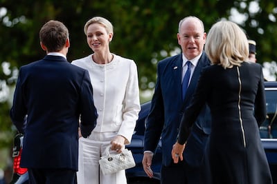 Prince Albert II and Princess Charlene of Monaco, pictured meeting the Macrons, were among those present for Pope Leo's speech in Metz, France. AFP