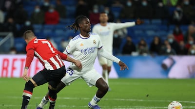Real Madrid midfielder Eduardo Camavinga evades a challenge from Athletic's Alex Belenguer. EPA