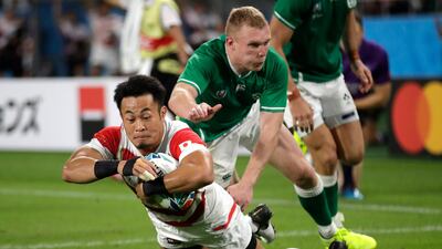 Japan's Kenki Fukuoka scores a try during the Rugby World Cup Pool A game at Shizuoka Stadium Ecopa between Japan and Ireland in Shizuoka, Japan. AP Photo