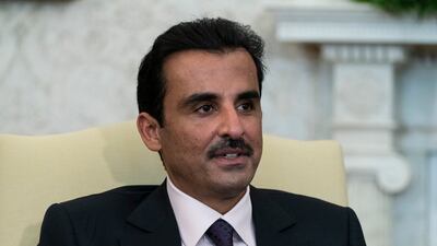 Qatar's Emir Sheikh Tamim during a meeting with US President Joe Biden in the Oval Office. AP
