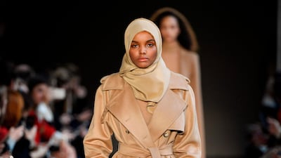 Halima Aden walks the runway at the Max Mara show during Milan Fashion Week Fall/Winter 2017/18. Pietro D'aprano / Getty Images