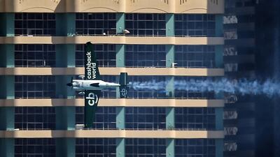 Pete Mcleod of Canada flies by a building. AFP