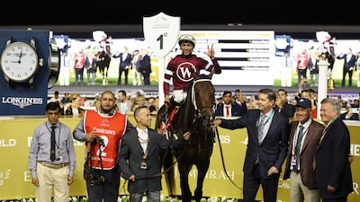 Jose Ortiz on Magnitude celebrates winning the Dubai World Cup. Reuters