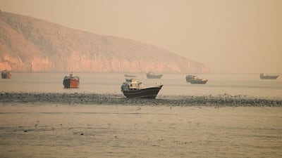Ships in the Strait of Hormuz, as seen from Musandum, Oman. Reuters