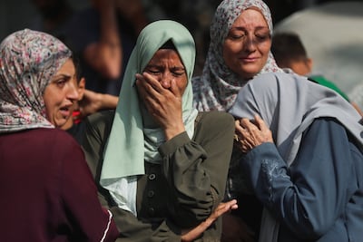 Mourners at the funeral of Palestinians killed in overnight Israeli air strikes at Al Shifa Hospital in Gaza city on July 21, 2025. Reuters