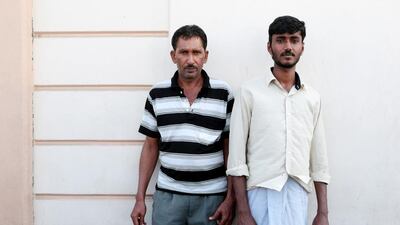 Raghveer Chand, left, a 45-year-old mason, and T Shiva, a 24-year-old electrician, from India, say working in the UAE brings more opportunity. Christopher Pike / The National