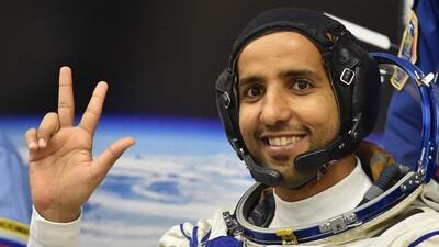 Hazza Al Mansouri waves before boarding the Soyuz rocket to the International Space Station. EPA