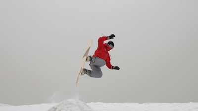 Mohammad Farzad, 20, practices on the hillside known as Kohe Koregh, on the outskirts of Kabul. (AP Photo/Rahmat Gul)