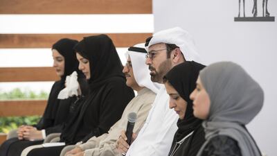 Mohammed Abdulla Al Gergawi, Minister of Cabinet Affairs and the Future, fourth left, at the Cabinet meeting. Also present are Shamma Suhail Al Mazrouei, Minister of State for Youth Affairs, left, Reem Ibrahim Al Hashimi, Minister of State for International Cooperation, second left, Sultan bin Saeed Al Mansouri, Minister of Economy, third left, Najla Al Awar, Minister of Community Development, fifth left, and Ohood Al Roumi, Minister of State for Happiness, right. Ryan Carter / Crown Prince Court - Abu Dhabi
