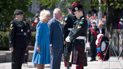 Prince Charles and Camilla, Duchess of Cornwall participate in a wreath laying ceremony at the National War Memorial in Ottawa, while on their Canadian Royal tour, Wednesday May 18, 2022. The Canadian Press/AP