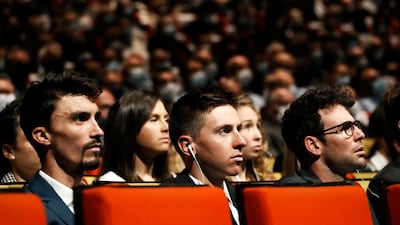 Julian Alaphilippe, Tadej Pogacar, and Mark Cavendish attend at the presentation of the 2022 Tour de France. AP