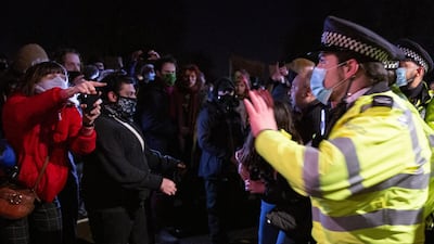 Some of those at Clapham Common chanted 'shame on you' at police who attempted to break up the gathering. EPA