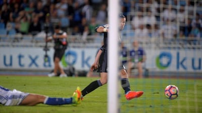 Real Madrid's Gareth Bale scores. (Vincent West/Reuters)
