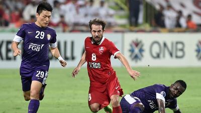 Playmaker Everton Ribeiro, centre, is set to play a key role in Al Ahli's season. STR / AFP