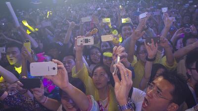 Alibaba employees celebrate at company's office in Hangzhou City, China. Sherwin / EPA