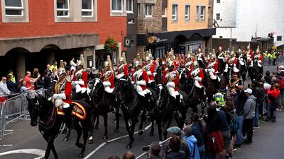 Members of the Kings Life Guard of the Household Cavalry march along the Royal Mile. Getty