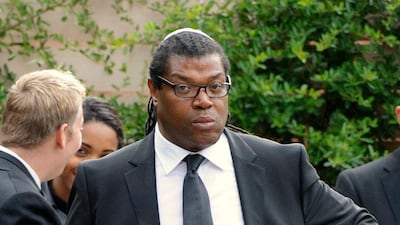 Manager Raye Cosbert arrives at the funeral ceremony. AP