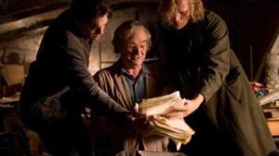 Brendan Fraser, Jom Broadbent and Paul Bettany in Inkheart.