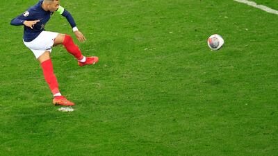 France's Kylian Mbappe scores from the penalty spot. AFP