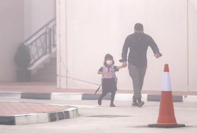 Abu Dhabi, United Arab Emirates, February 14, 2021. Pupils return to Abu Dhabi's private schools. GEMS United Indian School – Abu Dhabi. A few students arrive in spite of the foggy conditions. Victor Besa/The National Section: NA Reporter: Anam Rizvi