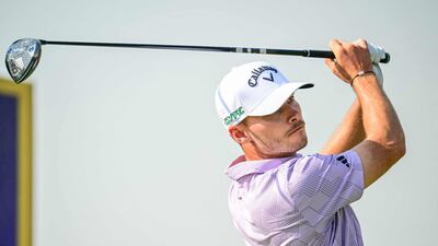 Denmark's Nicolai Hojgaard tees off at the ninth hole on day two of the DP World Tour Championship at Jumeirah Golf Estates in Dubai. AFP