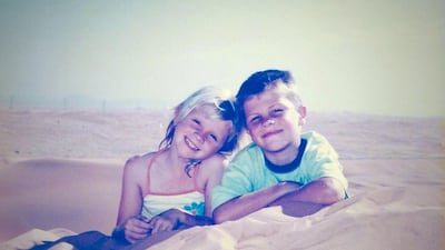 Michael and his sister Lucy in the Dubai desert as kids. Courtesy Michael Alcock