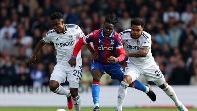 Jeffrey Schlupp of Crystal Palace is challenged by Luis Sinisterra and Weston McKennie of Leeds. Getty