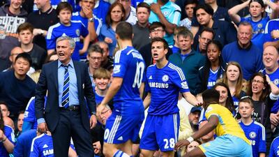 Chelsea are playing and winning just the way manager Jose Mourinho, left, wants them to. Mike Hewitt / Getty Images