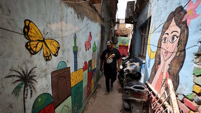 Art work painted on houses in Baghdad's Al Anbari neighbourhood. All photos: AFP