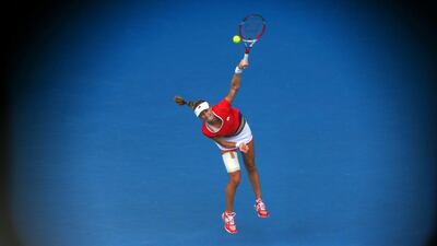 Ekaterina Makarova serves to Simona Halep during their Australian Open quarter-final match on Tuesday. Scott Barbour / Getty Images