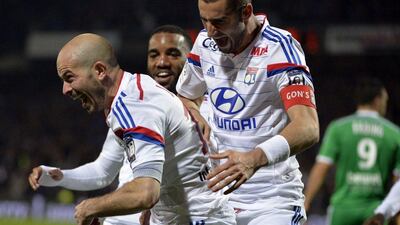 Lyon's Cristophe Jallet celebrates after scoring the equaliser on Sunday in a 2-2 Ligue 1 draw with Saint-Etienne. Jean-Philippe Ksiazek / AFP / April 19, 2015