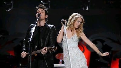 John Mayer and Taylor Swift. Bryan Bedder / Getty Images / AFP