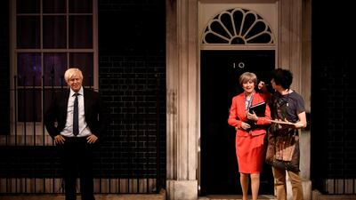 Madame Tussauds waxworks of Boris Johnson and Theresa May, whose policies have contributed to inequities in the UK. Reuters
