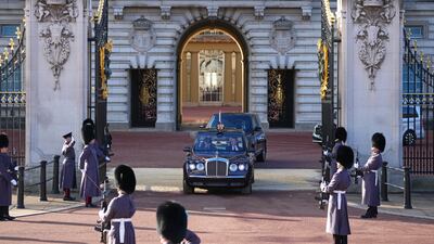 King Charles and the queen consort leaving Buckingham Palace in the royal entourage. Getty Images