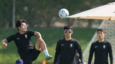 South Korea's Son Heung-min, centre, Hong Chul, left, and Son Jun-ho during training on Sunday. AP