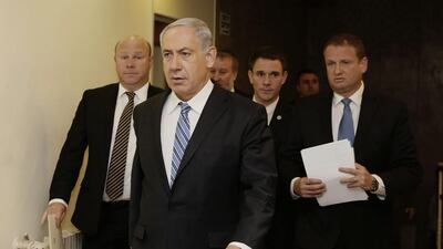 The Israeli prime minister Benjamin Netanyahu arrives for the weekly cabinet meeting in Jerusalem on Sunday. Gali Tibbon / AFP