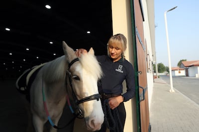 Horse trainer Faye Galvin with Ally. Chris Whiteoak / The National