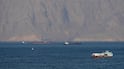 Ships and tankers wait in the Strait of Hormuz off the coast of Musandam, Oman. Reuters