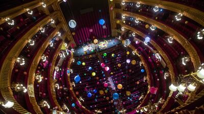 The auditorium of the Liceu Theatre is decorated with colorful balloons during a presentation of Brazilian artist Flavia Junqueira's installation in Barcelona, Spain. EPA