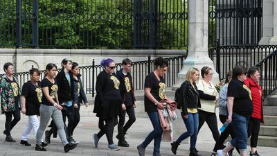 Friends arrive for the funeral service for journalist Lyra McKee. PA via AP